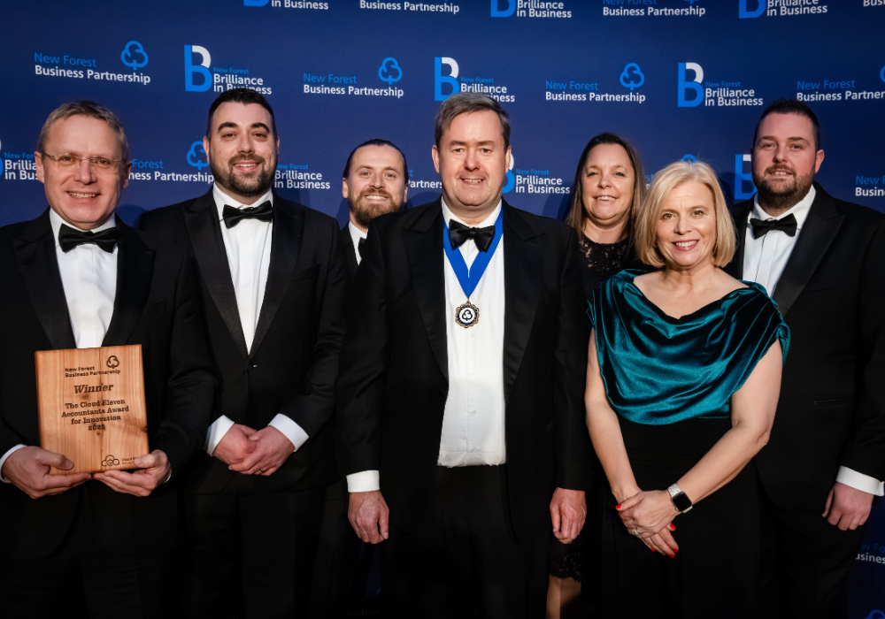 The Silclear team posting with the Award for Innovation at the New Forest Business Awards 2025 From left to right: Ian Bradbury (Silclear Managing Director), Terry Peel (Silclear Operations Director), Carl Garner Watts (Silclear Marketing Manager), Mattheew Lawson (Chairman of New Forest Business Partnership), Heidi Everingham (Silclear Customer Service & Sales Coordinator), Jan Willis (Cloud Eleven Accountants Principle), Michael Denton (Silclear Financial Controller).