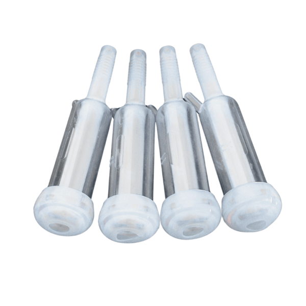 A set of four white silicone milking liners in shells